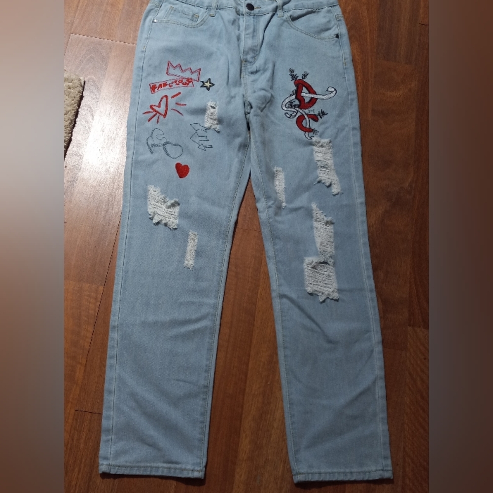 Stylish Light Blue Distressed Jeans with Red Accents Unisex Size 34
